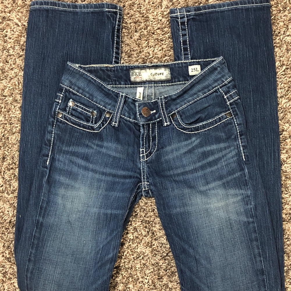 Boot cut denim jeans.